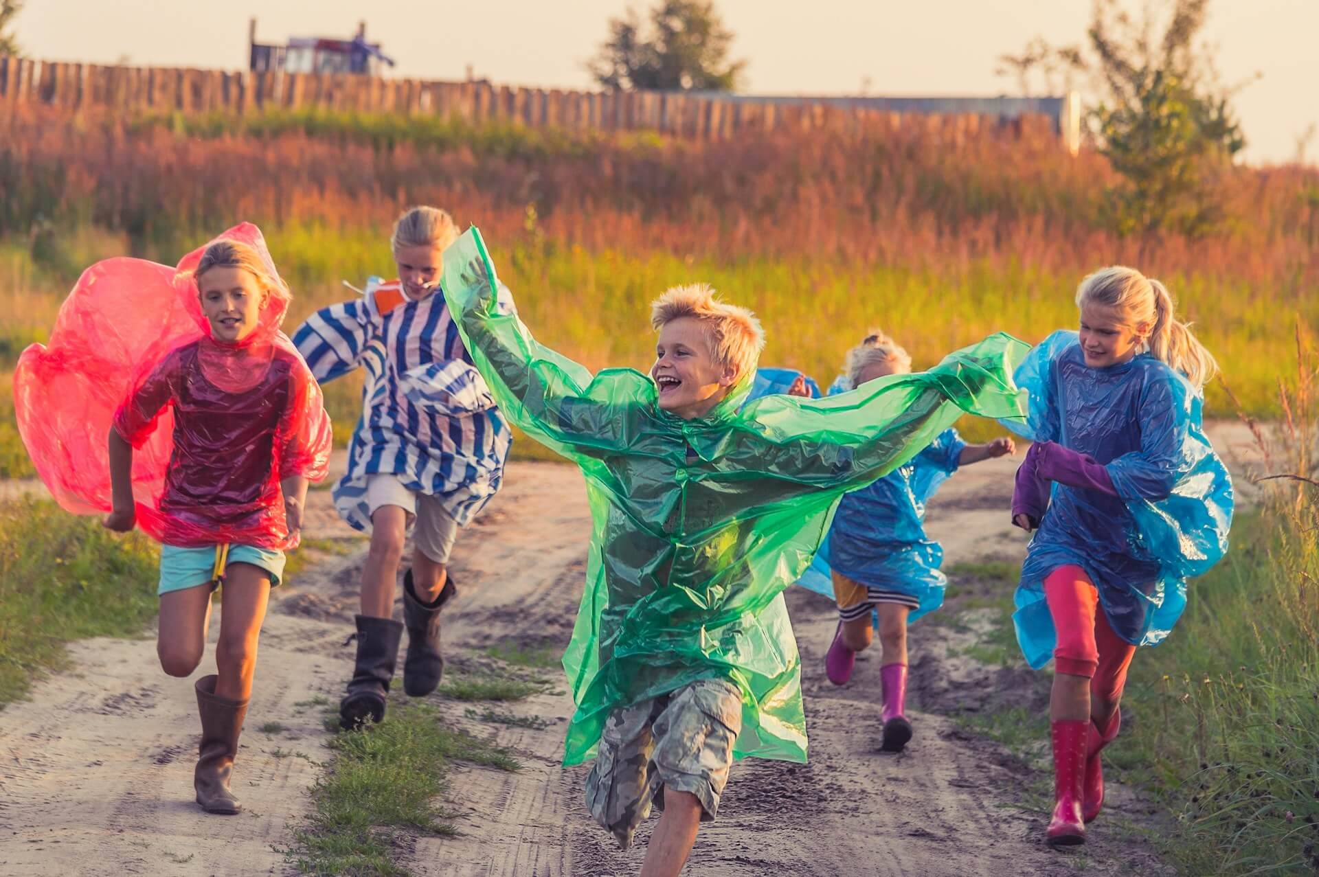 Children running in a field