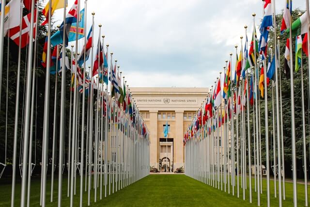 Outside of United Nations building with flags