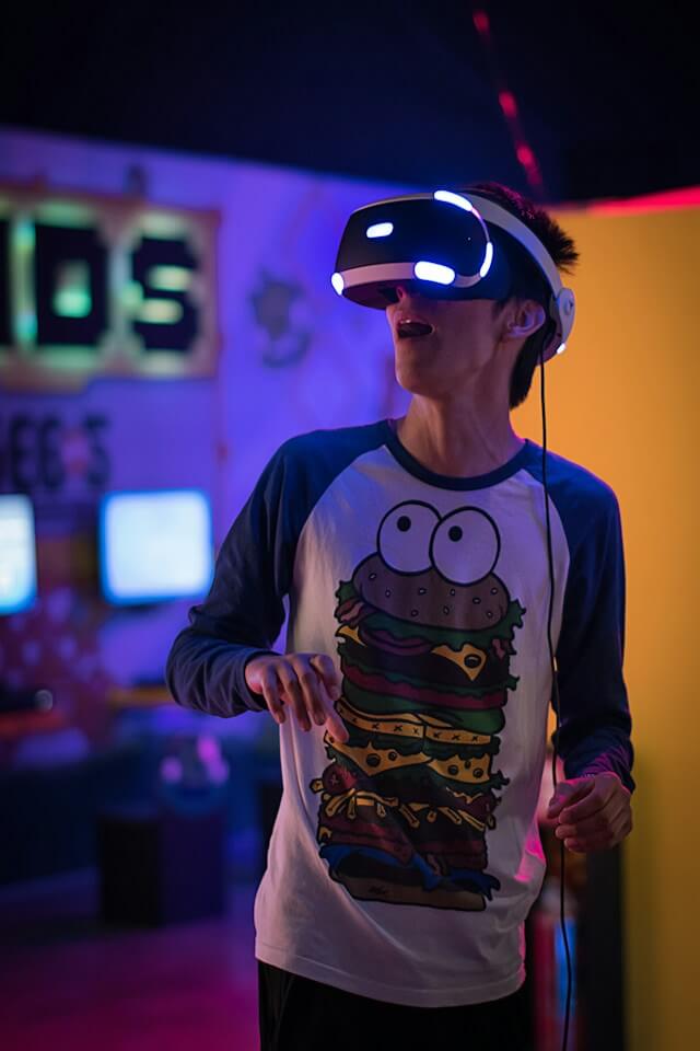 A young man wearing a VR headset